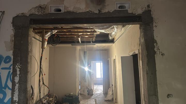 Enfilade de pièces après l'ouverture de murs porteurs