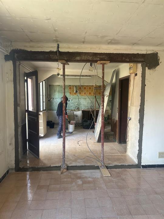 Ouverture entre deux pièces dans un mur porteur, sous étais